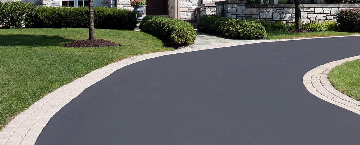 Enhancing Curb Appeal With Creative Design Ideas For Asphalt Paved Driveways